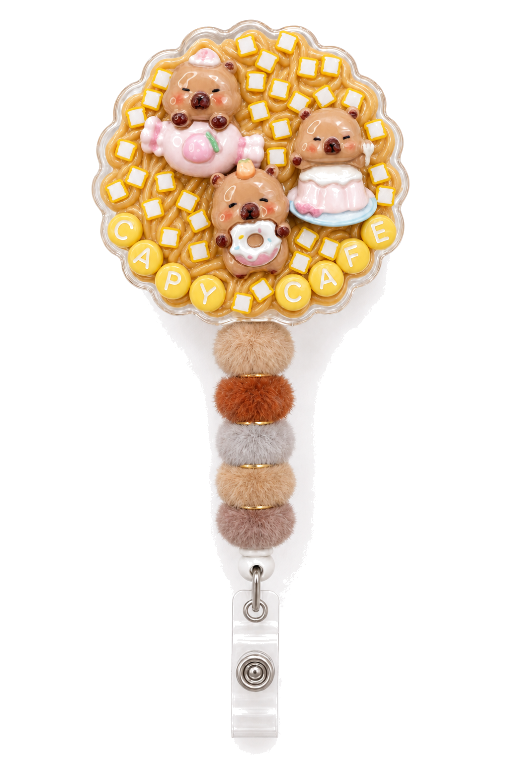 CAPY CAFE capybara decoden cream badge reel with pastry charms, toast sprinkles and neutral pom-pom beads on a pure white background