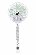 Decoden Cream Badge Reel — LPN Edition