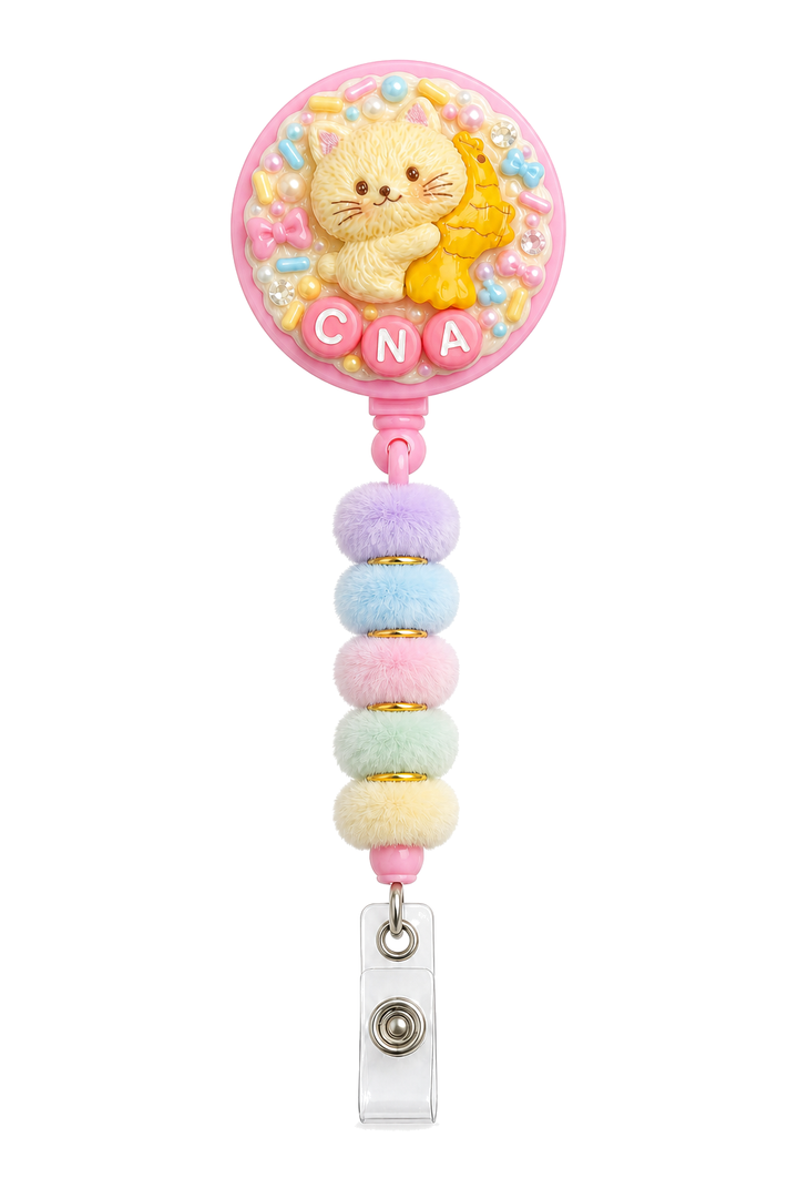 Mini Decoden Cream Badge Reel — CNA Cat & Fish Edition