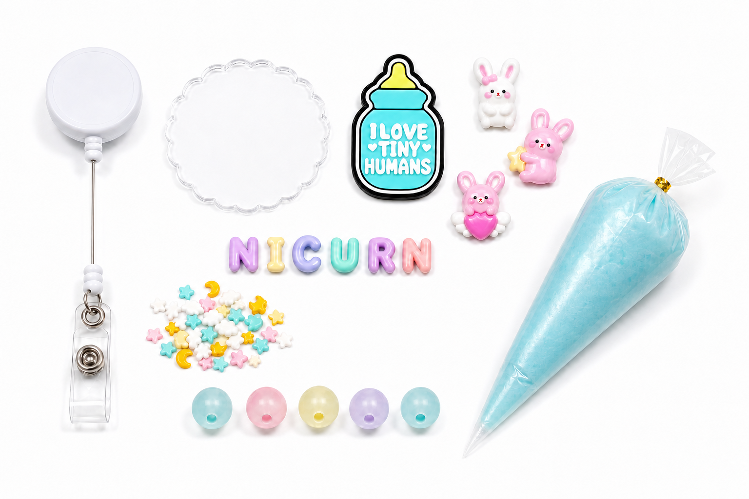 NICU RN Tiny Humans DIY badge reel kit with baby bottle charm, NICU RN letters, bunny pieces, stars, moons, frosted beads, reel and blue cream glue