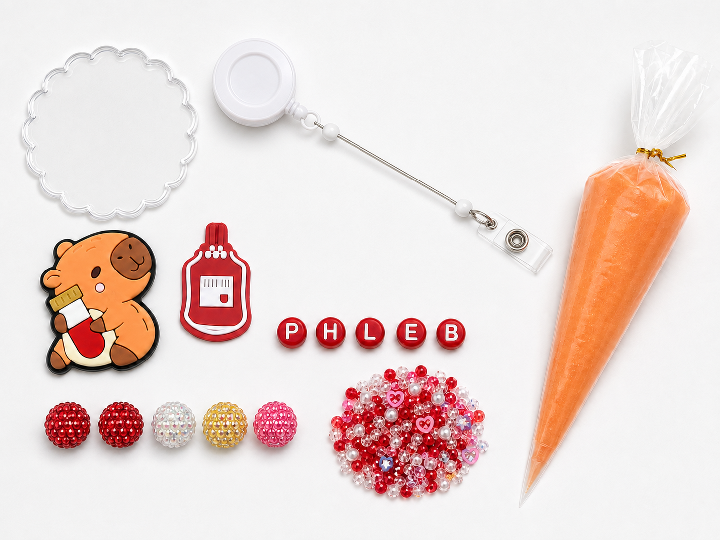 PHLEB phlebotomy DIY badge reel kit with capybara and sample-tube charm, blood bag charm, letters, five rhinestone beads, filler and orange cream glue