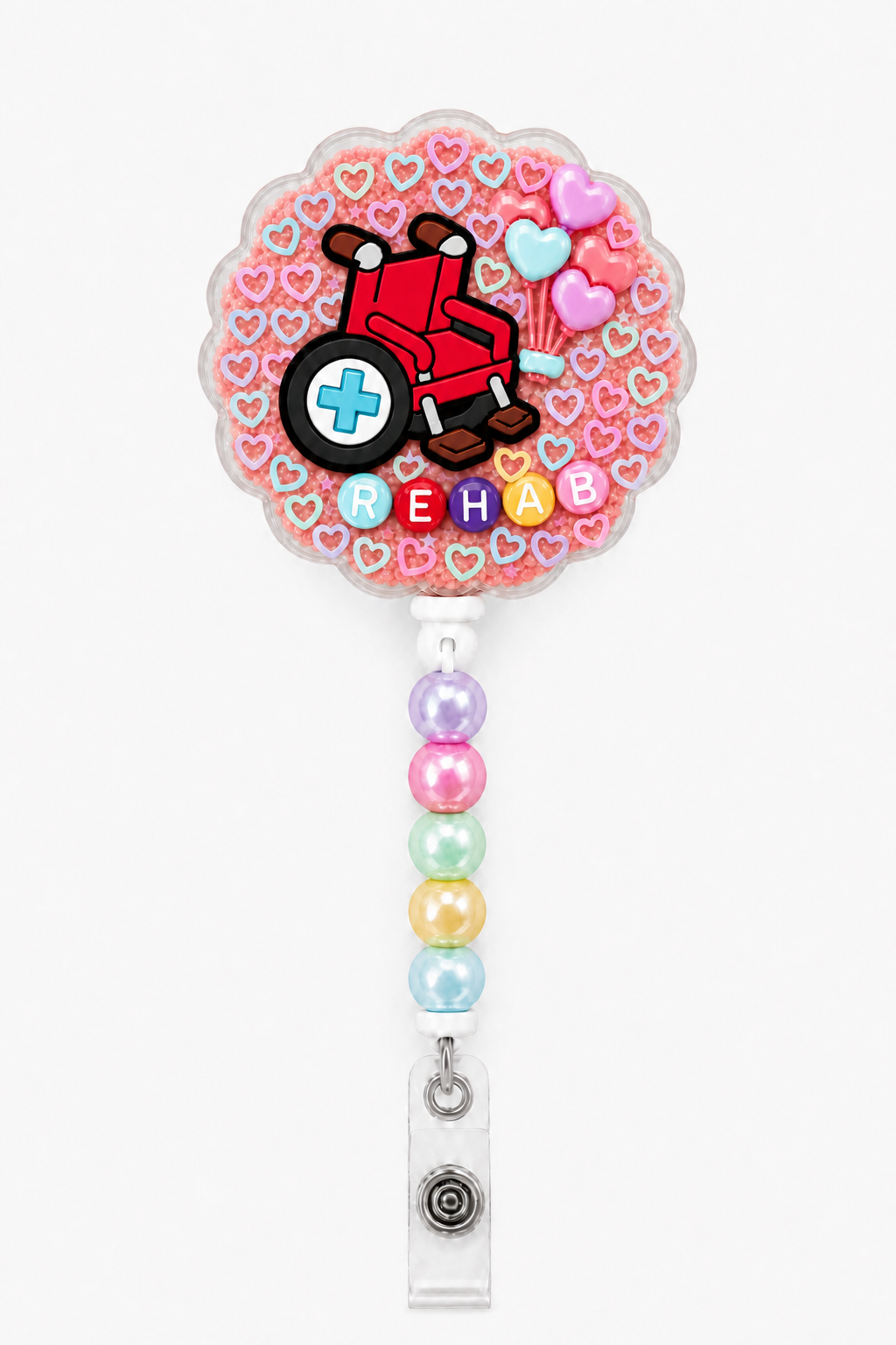 REHAB wheelchair decoden cream badge reel with heart balloons, colorful open-heart sprinkles and pastel pearl beads on a pure white background