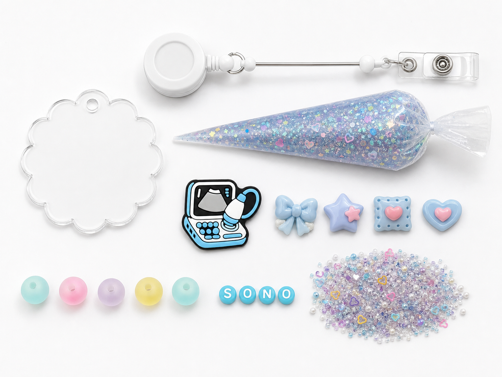 SONO ultrasound DIY badge reel kit with ultrasound machine charm, pastel bow, star and heart accents, letters, five frosted beads and blue glitter cream glue
