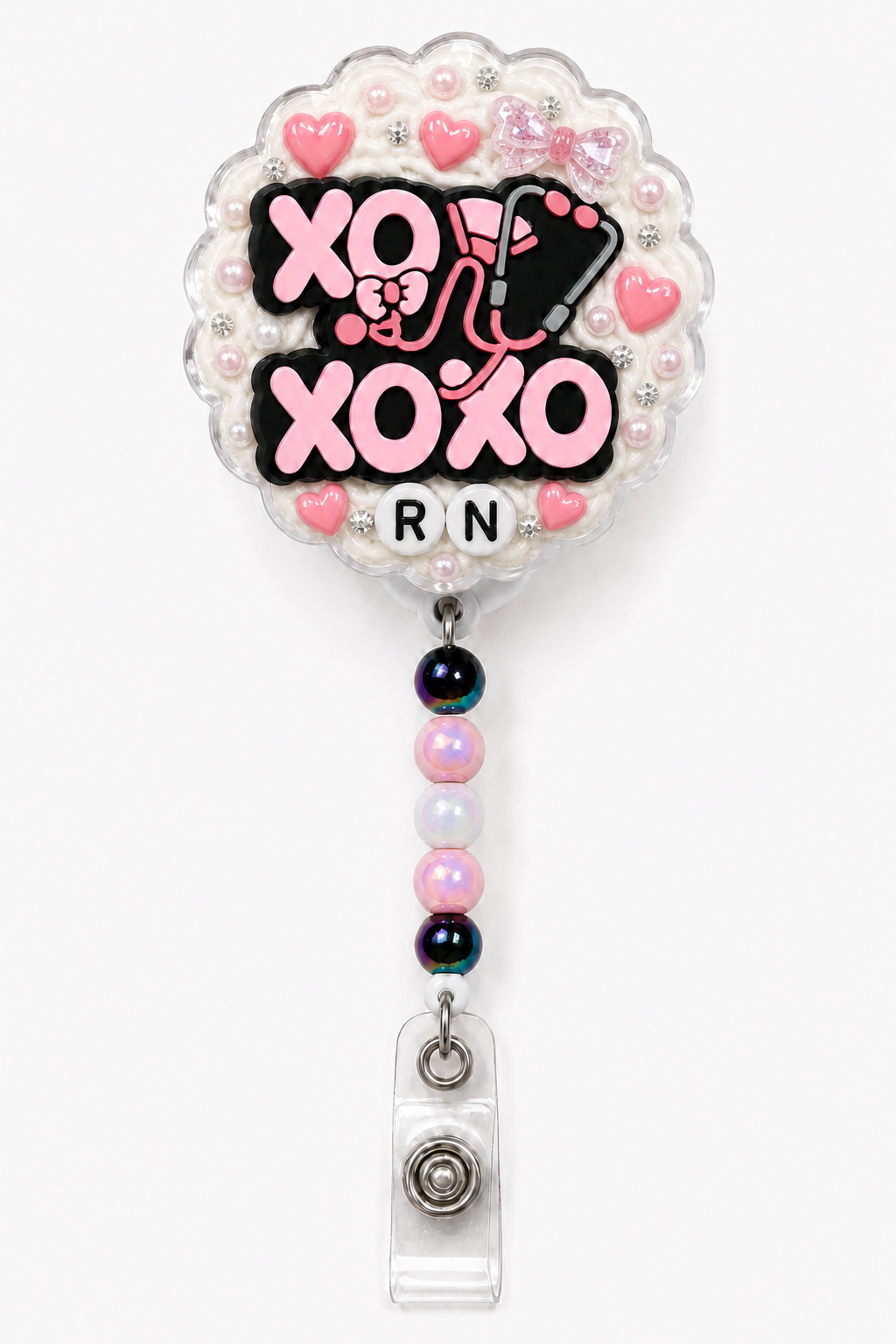 XOXO Nurse RN decoden cream badge reel with stethoscope charm, pink hearts, bow, pearls and pastel beads