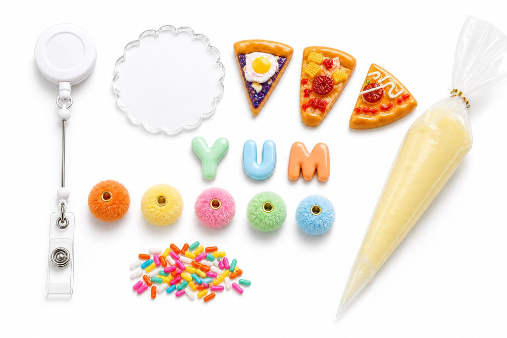 YUM Pizza DIY badge reel kit contents with pizza charms, letters, beads, sprinkles, and cream glue